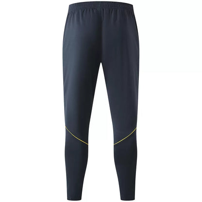 Barcelona kinder trainingspak met 1/4 rits marineblauw 2026/27